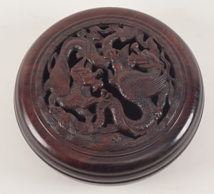 Carved wooden pomade box. China. 20th century. Huang Hua Li carved and pierced with dragons. Signed.