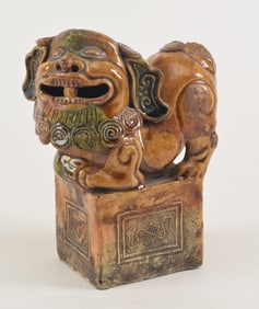 Pottery joss stick holder. China. 19th century. Foo dog form. Loss. 6in high.