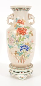 Satsuma vase and stand. Japan. 19th century. Elephant form handles, baluster shape. Decoration of