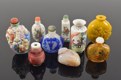Lot of 9 snuff bottles. China. 19th/20th century. To include: 3 glass, 5 porcelain and one of agate.