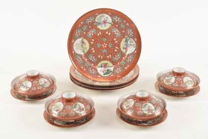 Set of porcelain tableware. China. 20th century. Orange ground with enamel decoration of children