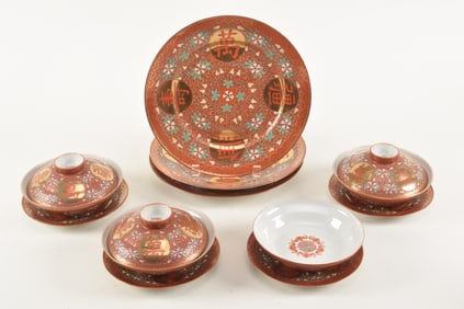 Set of porcelain tableware. China. 20th century. Orange ground with enamel decoration of gourds and