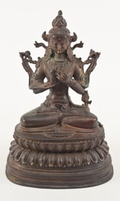 Bronze image of a buddha. Nepal. Early 20th century. Seated figure of Tara. 13.5in high.