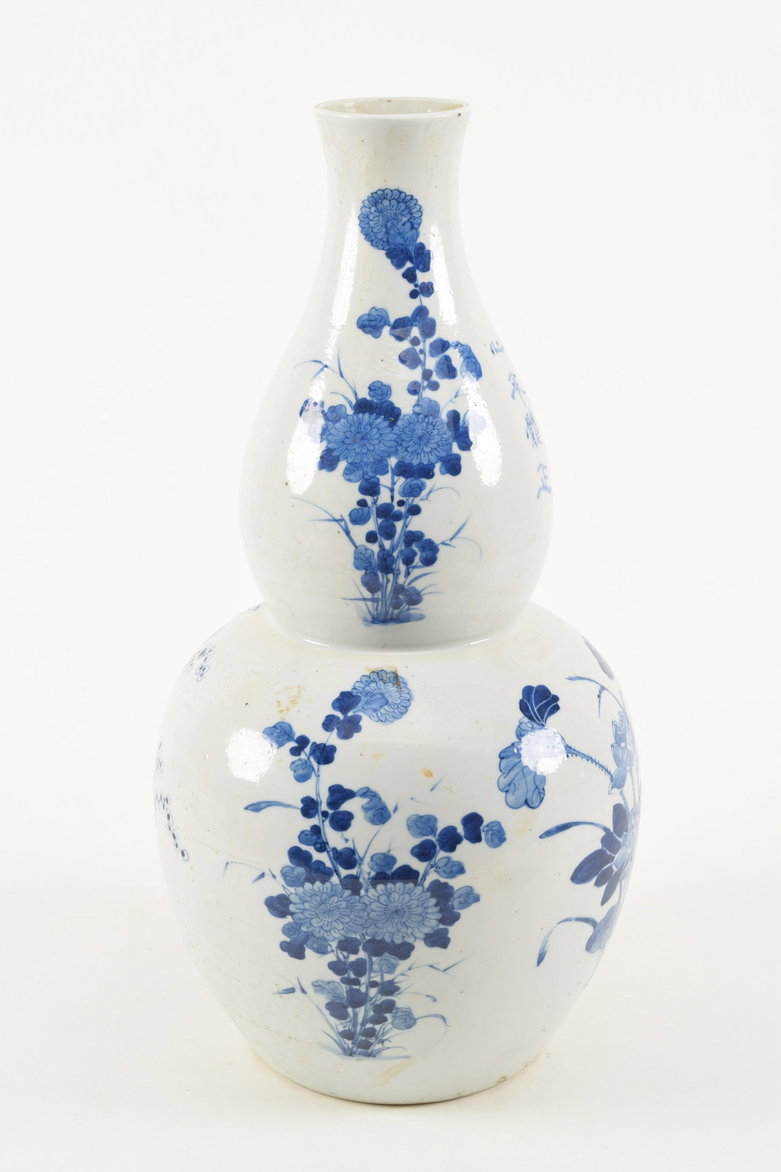 Porcelain vase. China. 19th/20th century. Underglaze blue floral decoration and inscriptions. Double (1 of 8)