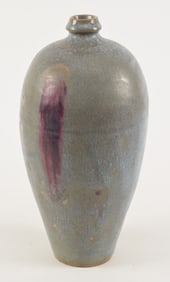 Chunyao porcelain vase. China. 19th century. Iridescent blue glaze and red streak. 13in high.