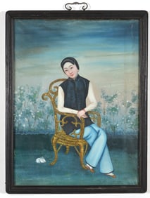 Oil on canvas painting. China. Ca. 1930. Woman seated in a cane chair with a pet rabbit. Rosewood fr