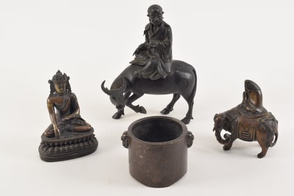 Lot of 4 bronzes. A 19th century inlaid buddha and 3 censers (2 animal and one cylindrical). Largest