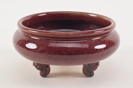 Sang de bouef censer. China. Early 20th century. Deep red glaze. Tripod animal form feet. 10.5 x