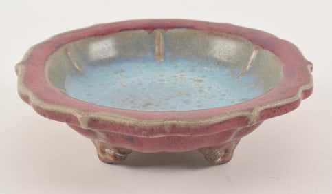 Stoneware footed dish. China. 20th century. Chun ware. Marked "Eight". 6.75in.
