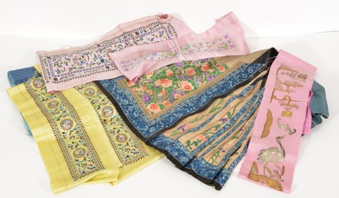 Lot of Chinese textiles including a skirt.