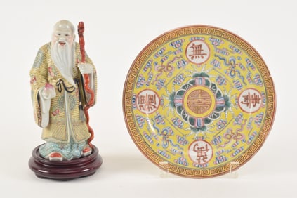 2 porcelains. Figure of Shao Lao and a yellow ground plate. China. 20th century. 7.75 and 8.25in.