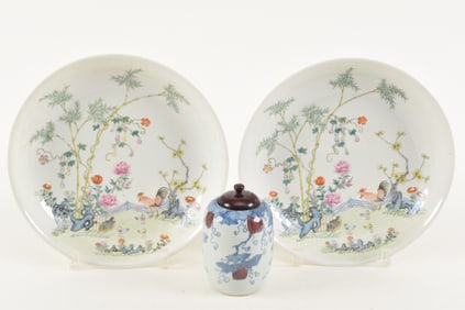 3 porcelains. China. 20th century. A pair of plates with famille rose decoration. And an underglaze