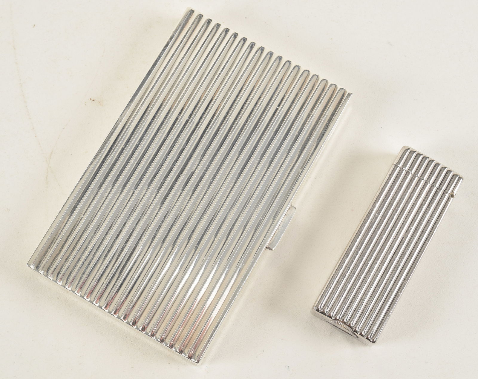 Tiffany & Co. sterling silver cigarette case with a Dunhill lighter. 4.25in length case. 4.1 ozt. (1 of 5)