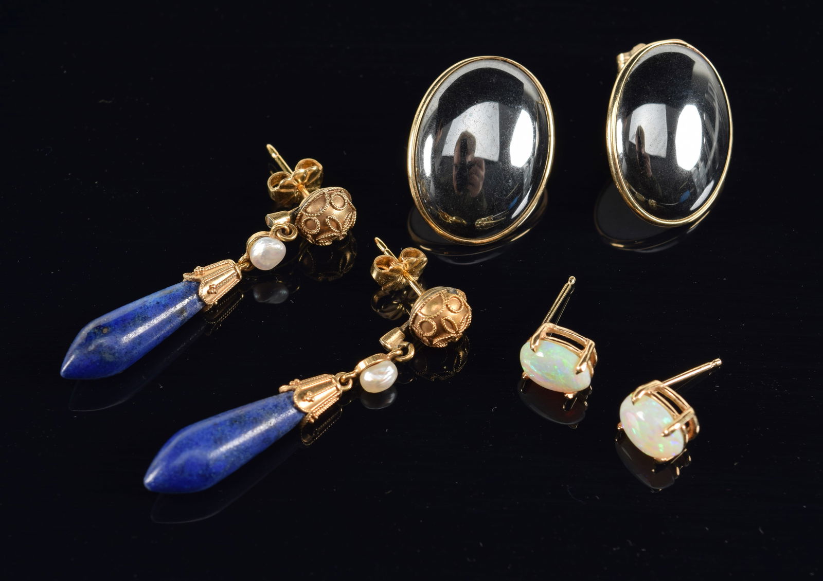 3 pairs of 14K gold earrings. 1) Lapis and pearl mounted drop earrings. Marked 14K. 2) Large oval (1 of 3)