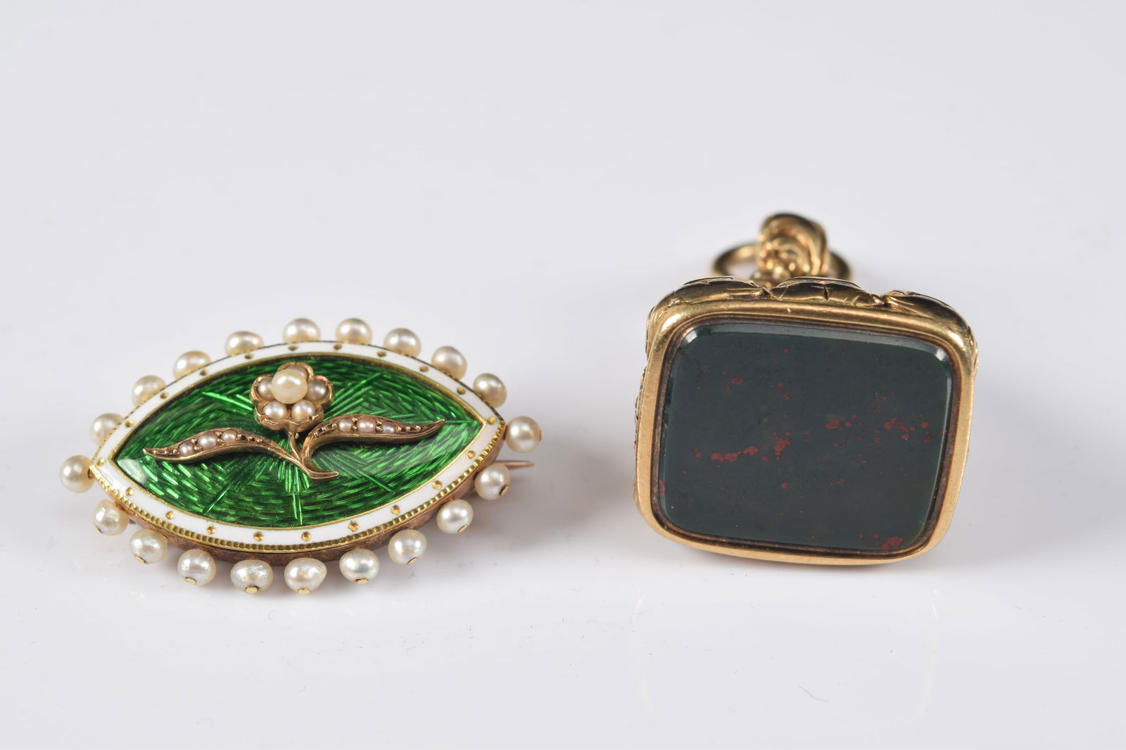 2 pieces of antique gold jewelry. 1) 14K gold watch fob set with rectangular bloodstone. Tests as (1 of 5)