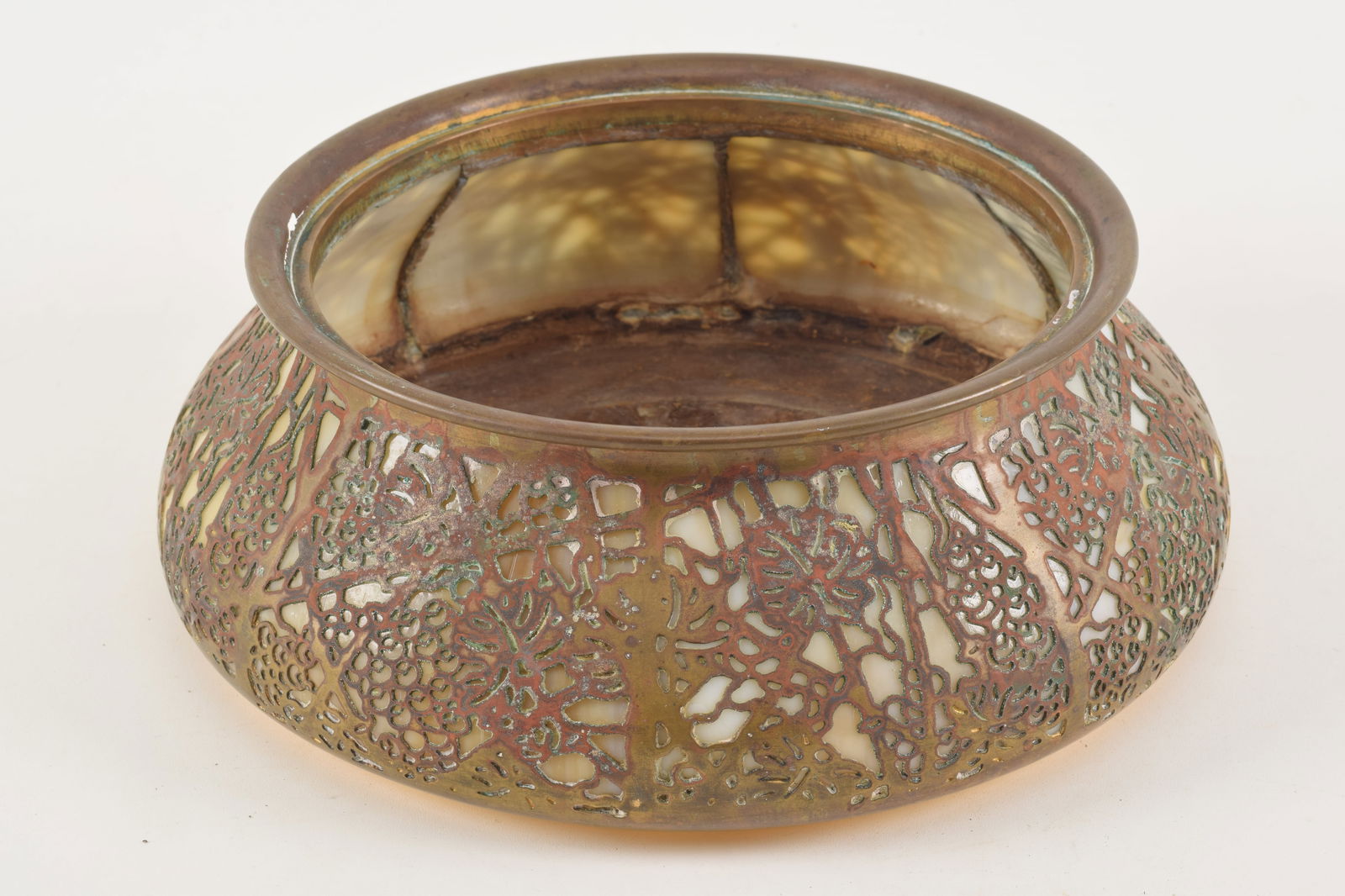 Tiffany Studios "Grapevine" bronze and slag glass jardiniere. Gilt finish worn in most areas except (1 of 5)