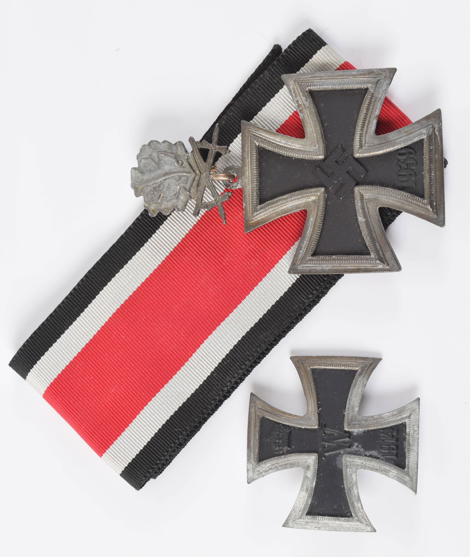 WWI and WWII German Iron Cross medals. WWI medal with some tarnishing on left edges. 1.75in. WWII (1 of 5)