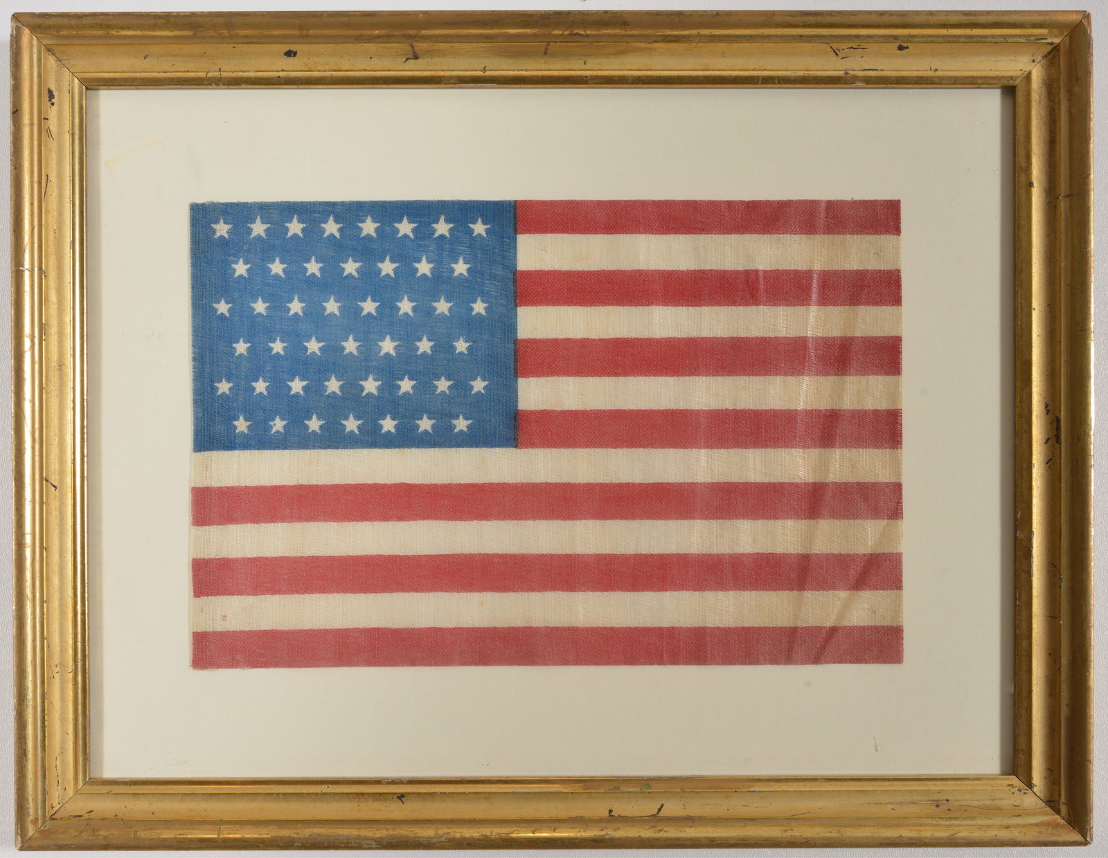 Framed 45 star American flag (1896-1908). Flag size: 7 x 10.25in. Overall: 12.25 x 15.5in. Staining (1 of 5)