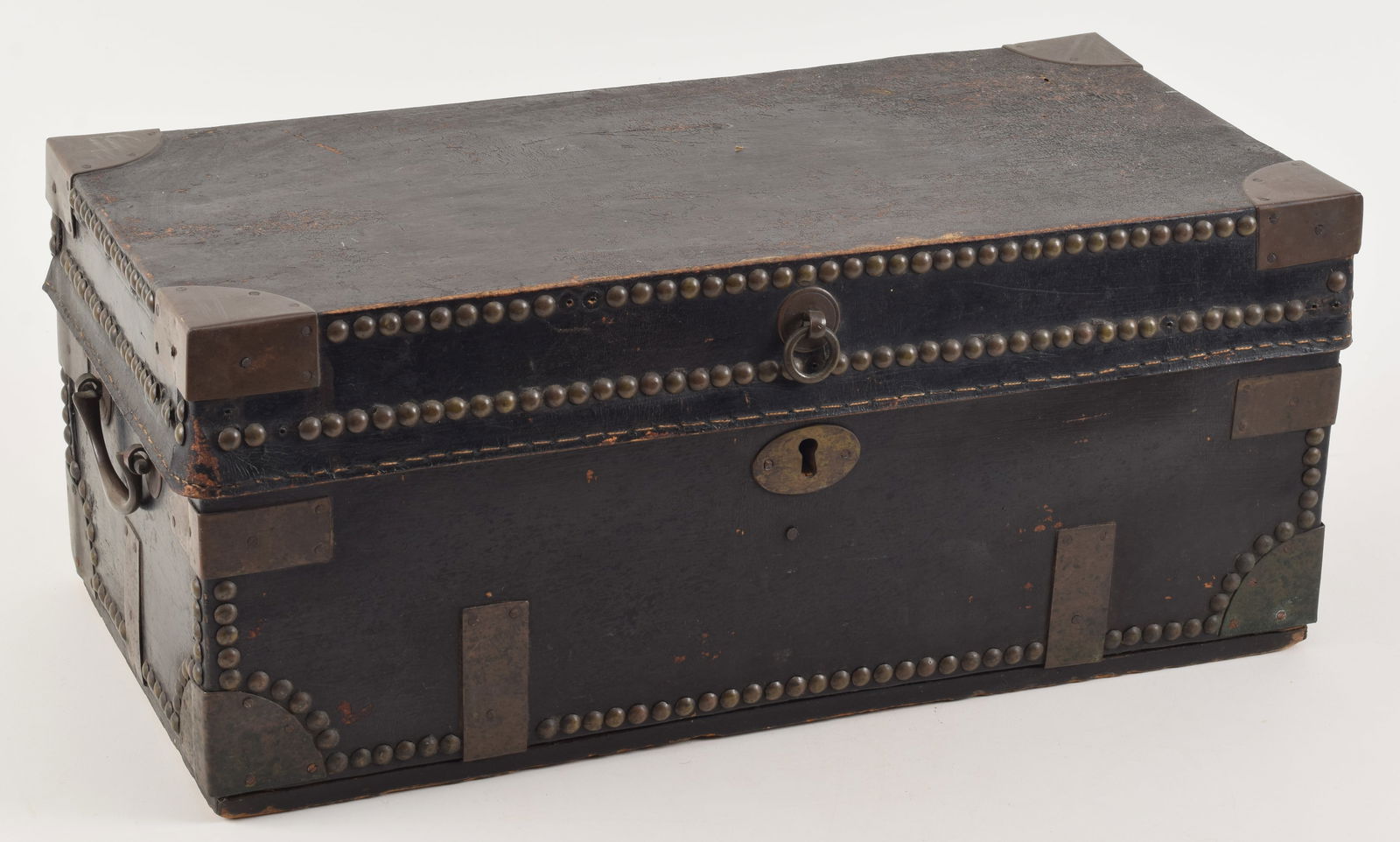 Early 19th century leather bound camphor wood chest. Brass banded and studded exterior. Wallpaper (1 of 6)