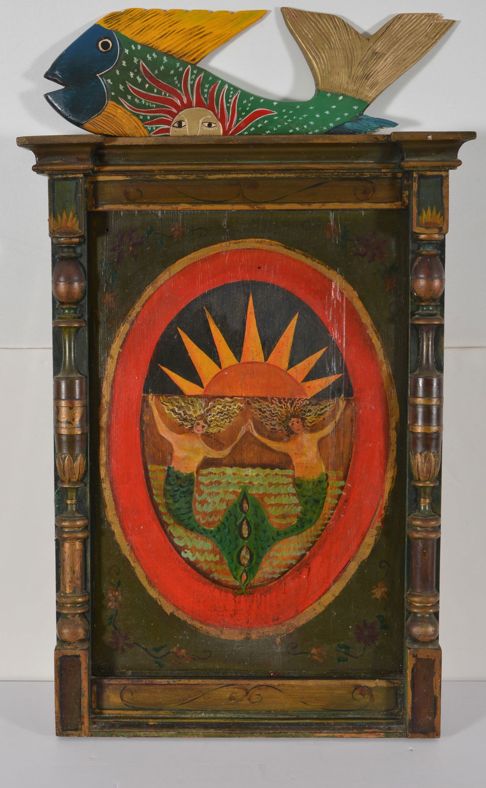 Antique mirror frame carved and painted with folk art decoration. Central motif of mermaids and topp (1 of 5)