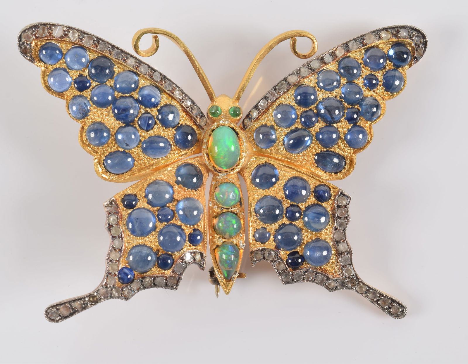 Gilt silver butterfly brooch set with rose cut diamonds, sapphires, opals, and emeralds. 2.75in wide (1 of 3)
