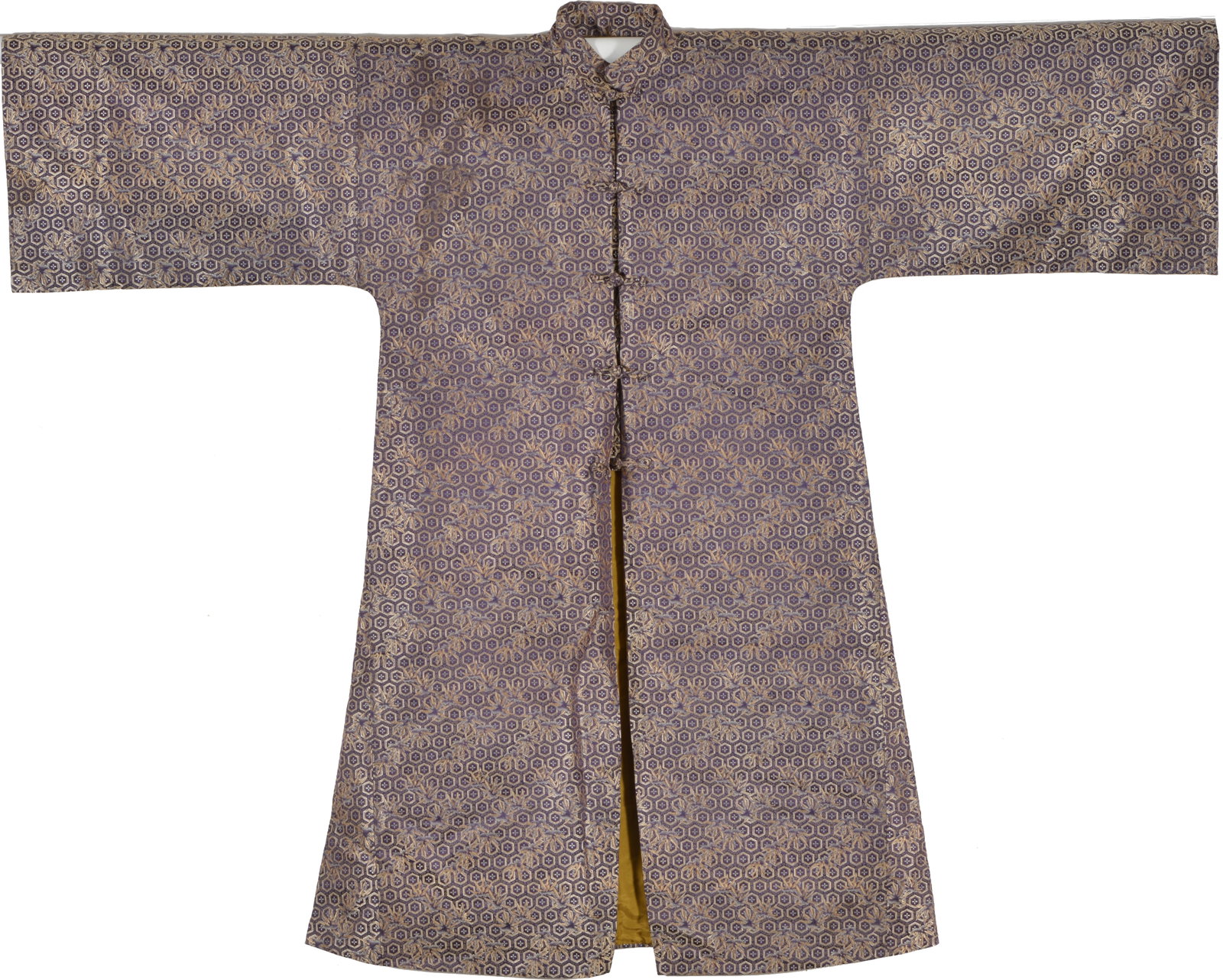Brocade robe. China. 19th century. Pattern of octagons with sprigs of bamboo on a dark blue ground.: Brocade robe. China. 19th century. Pattern of octagons with sprigs of bamboo on a dark blue ground.