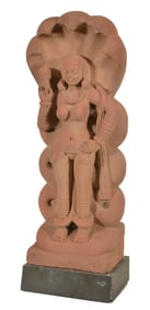 Carved red sandstone figure. India. 18th century. figure of a chauri bearer with a Nagaraja at the