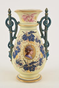 Large 19th century Paris porcelain ivory color ground vase with classical head medallion and grape