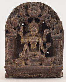 Wood carving of a tantric divinity. Nepal. 17th century. Figure of Shadakshari Lokishvara seated