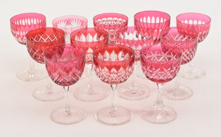 12 cranberry cut-to-clear cut glass wine glasses. Individual patterns including American and