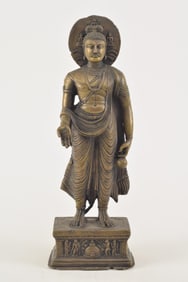 Bronze image of the buddha. India. 19th century. 13.5in high.