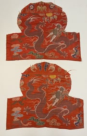 2 textile fragments. China. Ming period (1368-1644). Chair covers in red brocade with dragons and