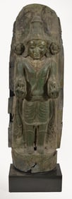 Large repousse bronze image of a divinity, probably Vishnu. South India. 18th century. 56 x 17in.