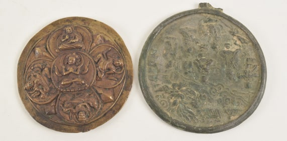 2 bronzes. To include: a Chinese 17th century mirror and a Tibetan 17th century boss with images of