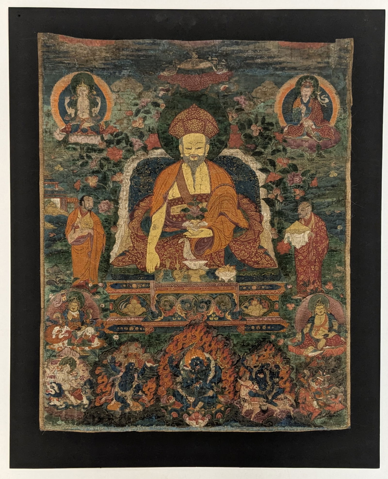 Buddhist icon. Tibet. 16th century. Thangka of Kagyu Lama with lineage figures. Ink and pigments on (1 of 3)