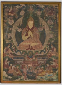 17th/18th century Tibetan thangka. Large central buddhist image surrounded by lineage figures. Loss