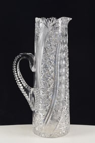 American brilliant cut glass champagne pitcher. Unusual pattern. Small flake chip on top tooth. Some