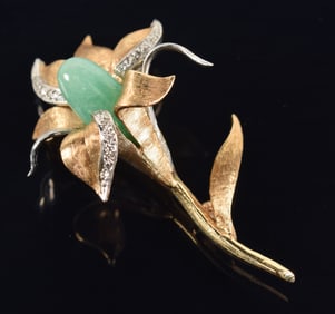 14K gold jadeite and diamond mounted white and yellow gold flower form pin. Marked 14K on stem. 2in