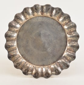 Sanborns Mexican sterling silver round scalloped edge tray, hand cut line and scroll decoration.