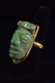 William Spratling 18K gold ring set with Pre-Columbian jade mask. Heavy gold setting. Mask with
