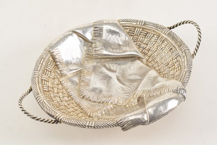 19th century Russian trompe l'oiel silver basket with blanket, attributed to Pavel Ovchinnicov.