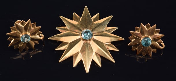 Black Star & Gorham 14K gold blue topaz mounted starburst pin and earrings set, ca 1940s. Marked B S