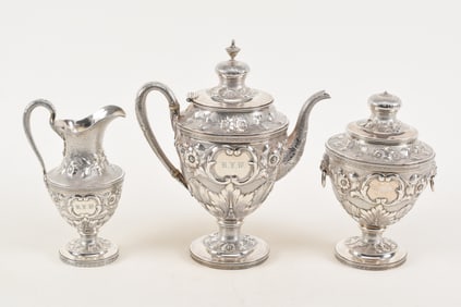 Tiffany & Co. 19th century three piece sterling silver tea set, tall pot, cream jug and a covered