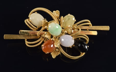 14K gold multi gemstone mounted brooch. Tiered openwork design. Marked 14K and 585 on reverse. 2.5in