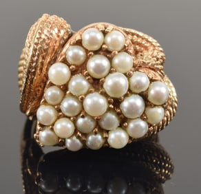 Heavy 14K gold heart form ring with seed pearls and rope textured setting. Marked 14K on underside.