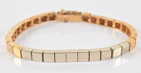 Vintage 18K white and yellow gold block chain bracelet. Marked 750 and ARYA. 7in length. 24 grams.