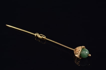 Cartier 14K gold chrysoprase bead mounted stickpin. Marked Cartier and 14K. Several slight dents.