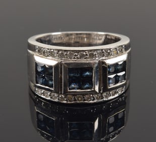 14K white gold diamond and sapphire ring. 3 sets of 4 square cut sapphires mounted together, flanked