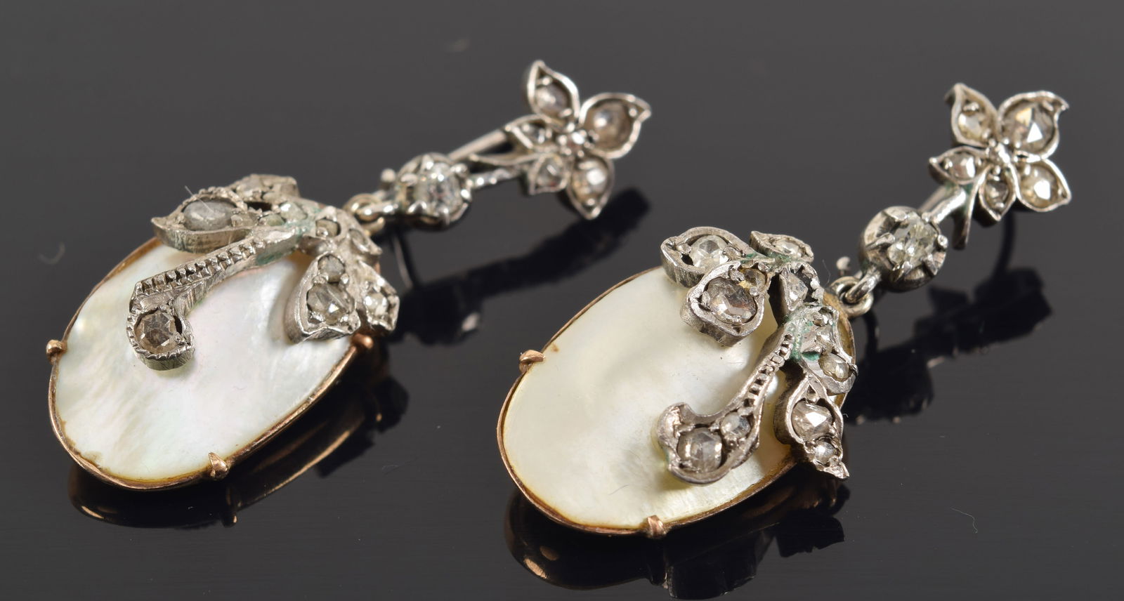 Antique 14K white and yellow gold diamond and mother of pearl earrings. Rough cut diamonds of (1 of 4)