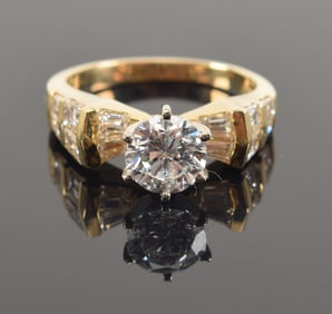 14K gold 1.01 CT diamond solitaire ring. Central round brilliant cut diamond approx 6.18 x 6.24 x